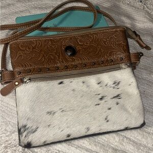 Myra Brown and White Women's hair on Bag